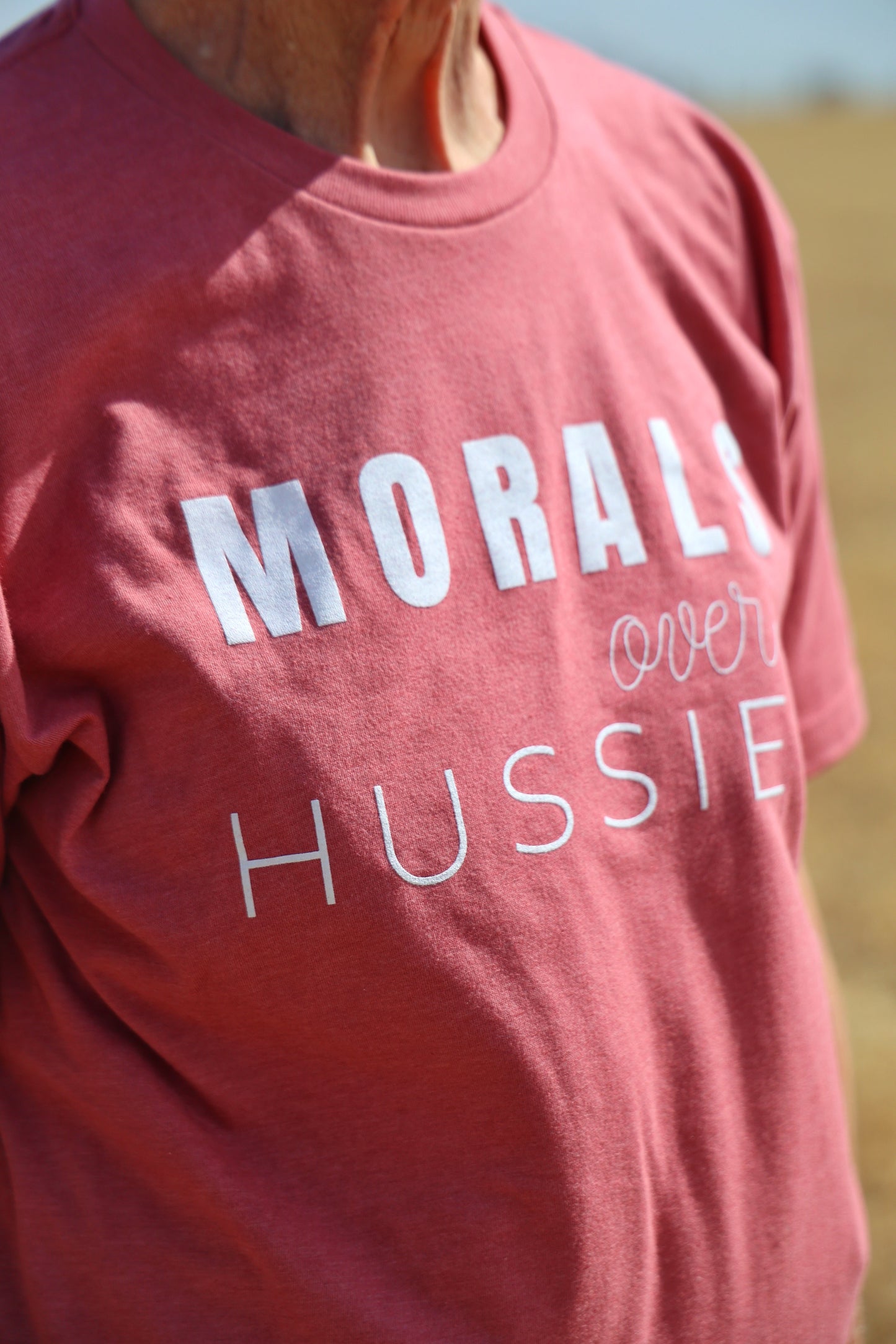 
                  
                    MORALS OVER HUSSIES TEE
                  
                
